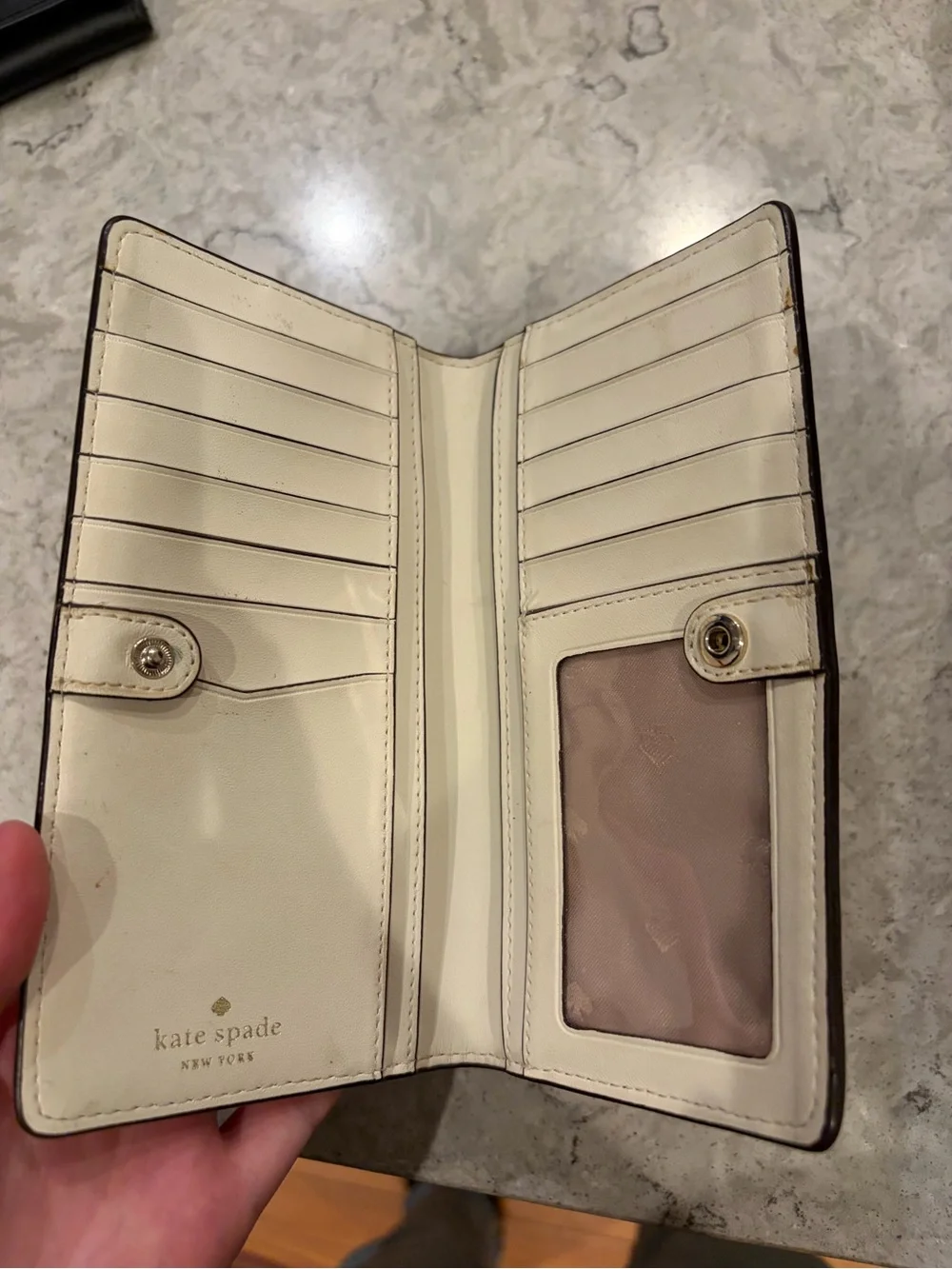 kate spade cream zip-around saffiano wallet with gold logo